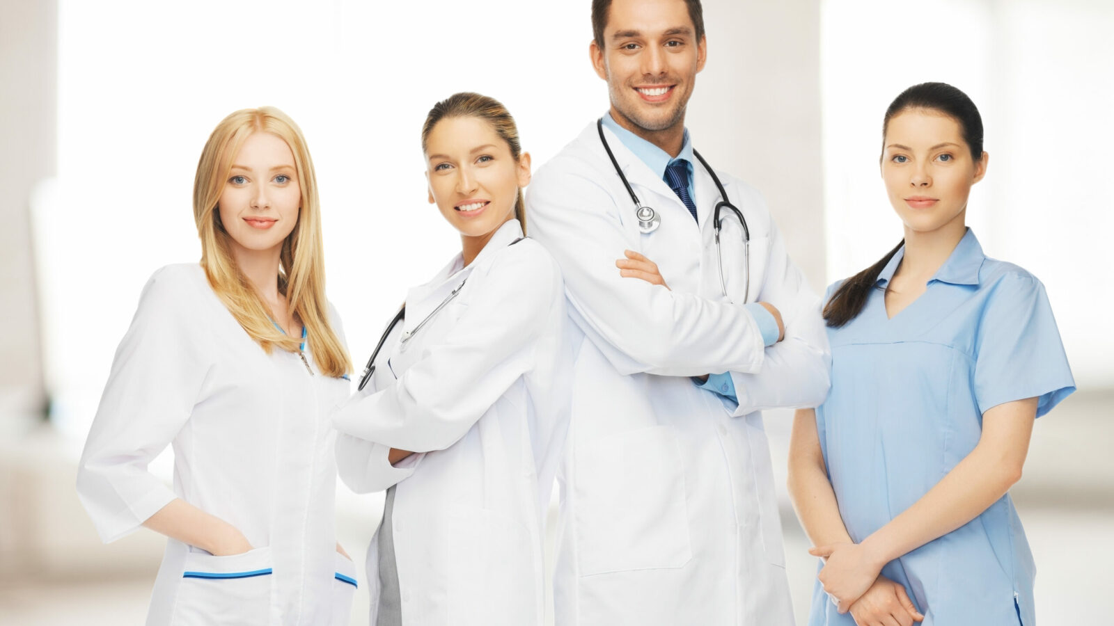 healthcare, hospital and medical concept - young team or group of doctors